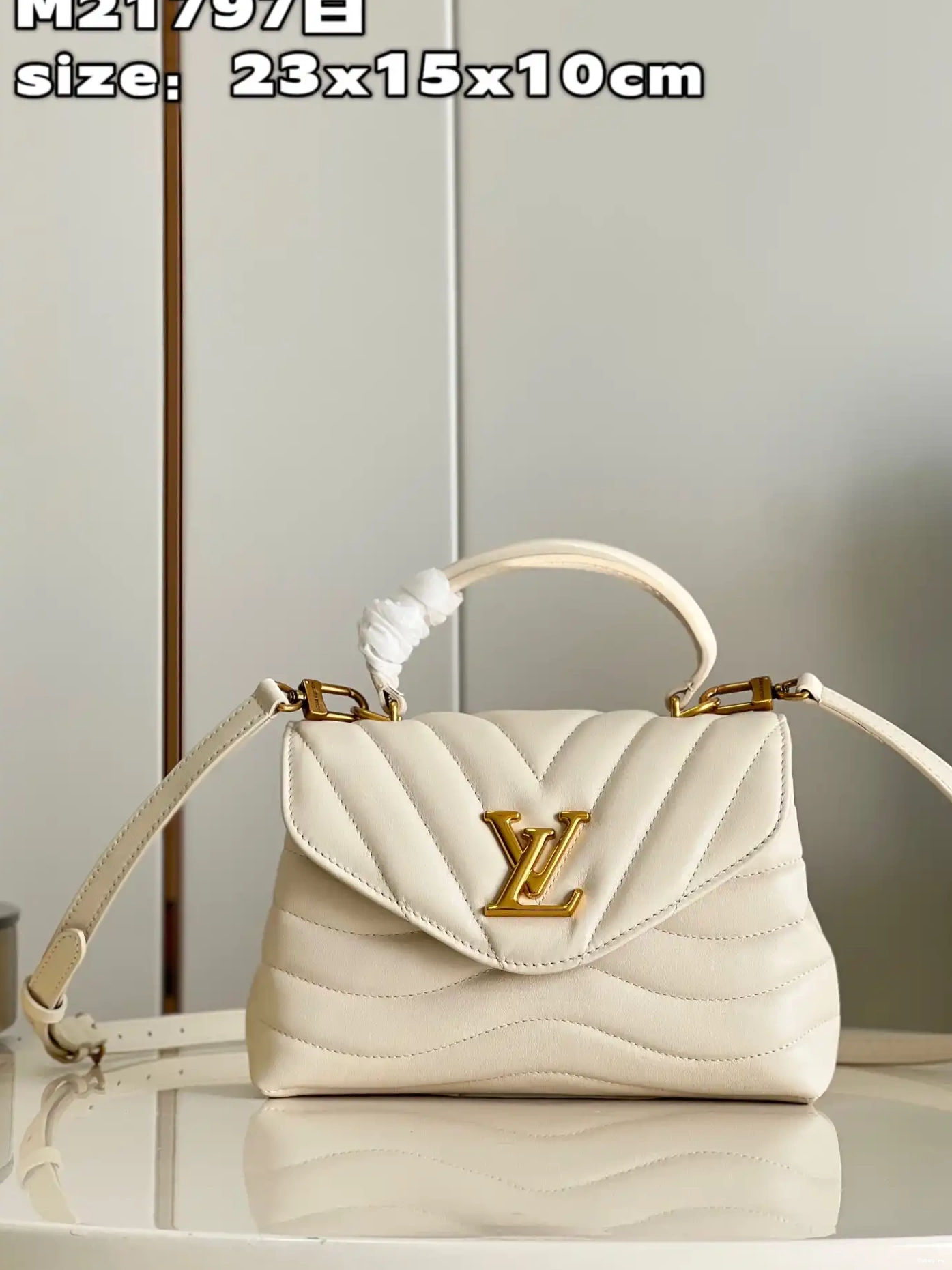 VUITTON ME HOLD LOUIS 0216